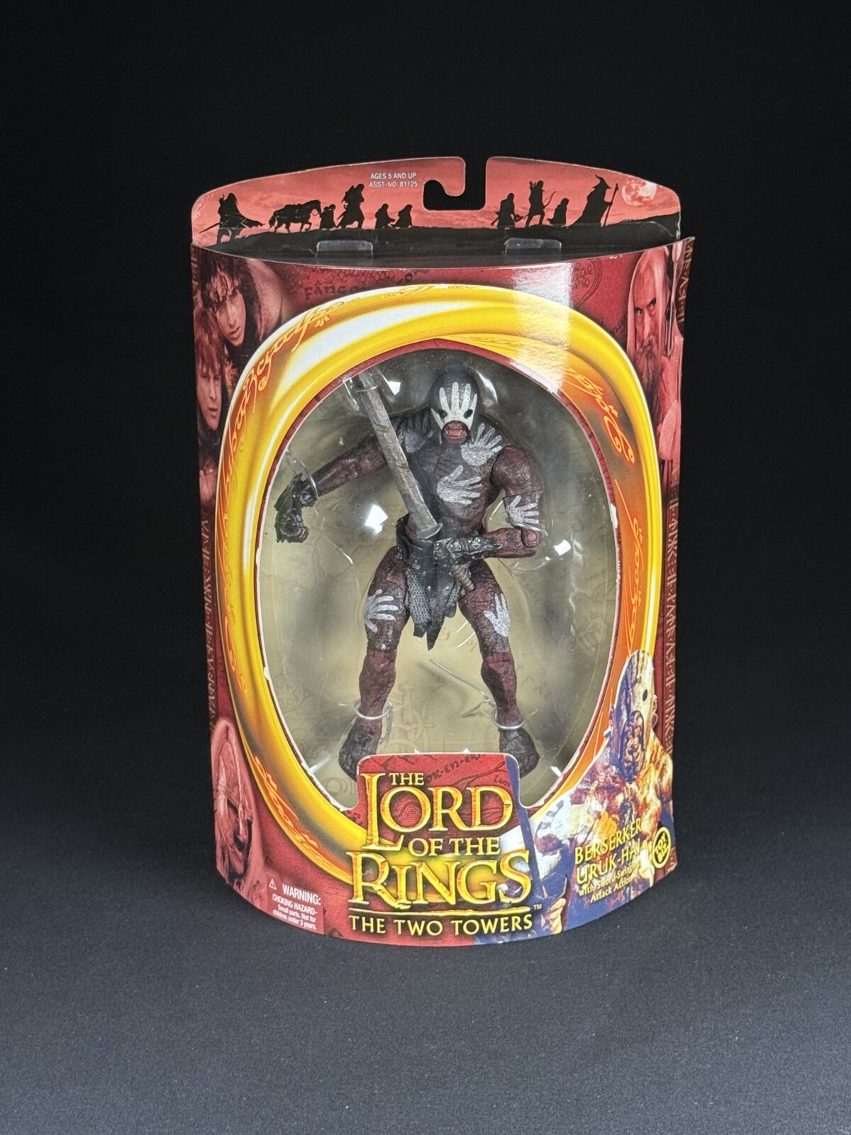 Berserker Uruk‑hai with Sword‑Swinging Attack – Lord of the Rings: The Two Towers (Toy Biz, 2002)